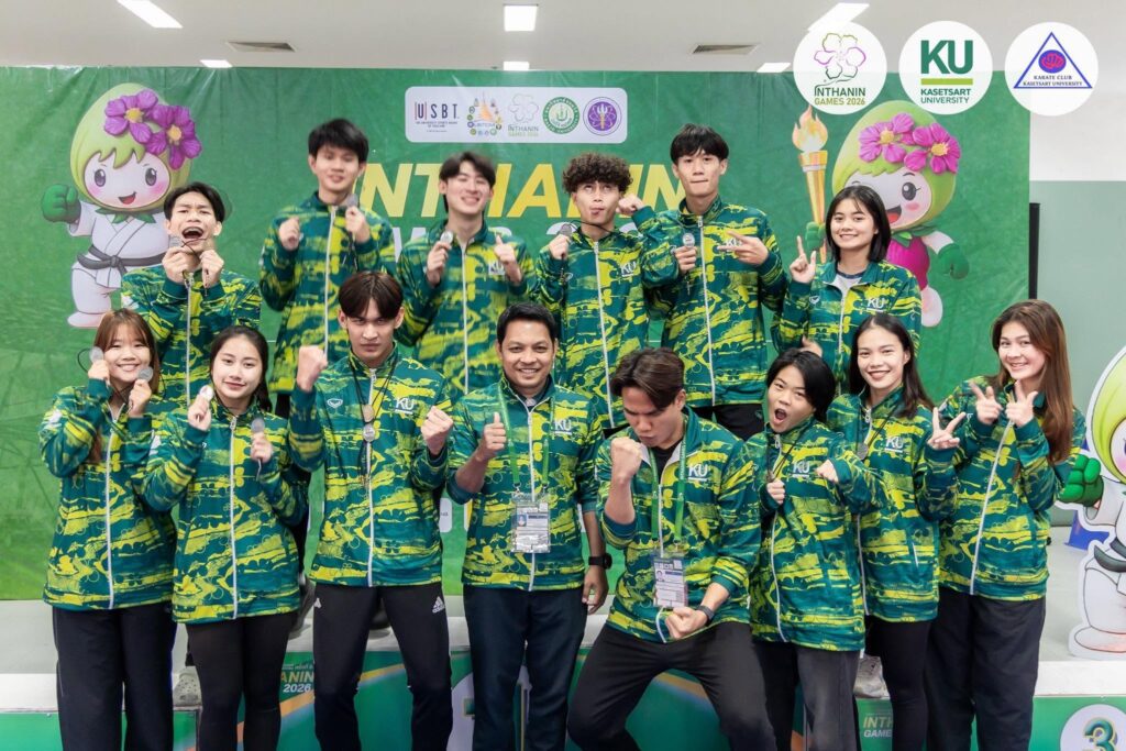 KU Karate Club team members in green team jackets