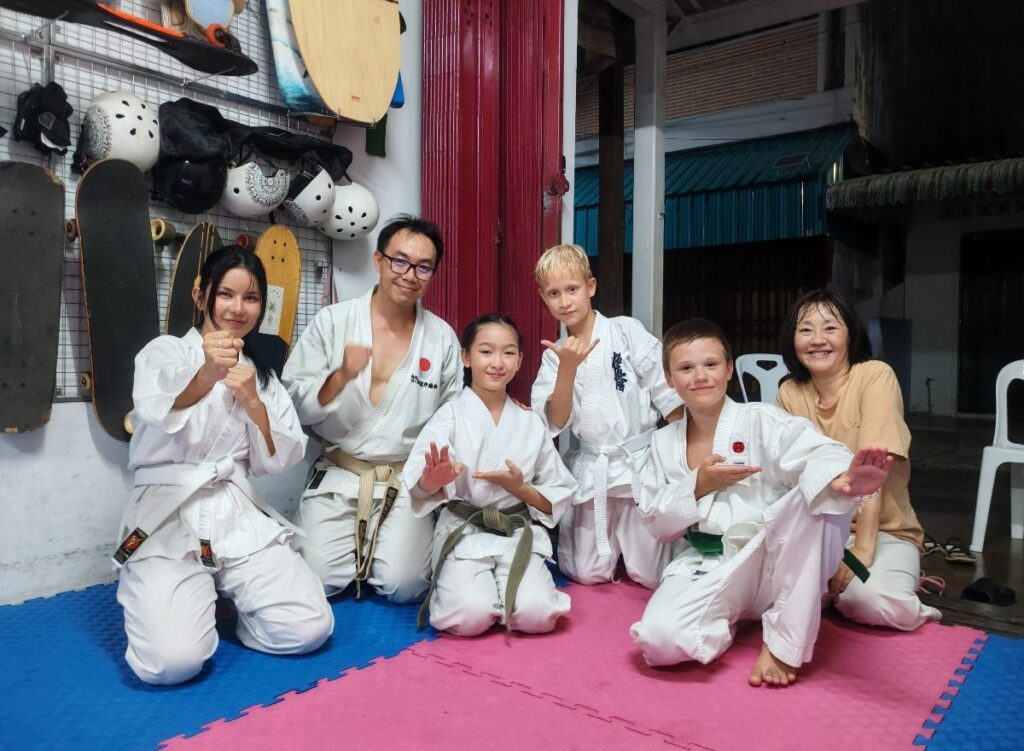 Phuket Karate Center members kneeling together after training