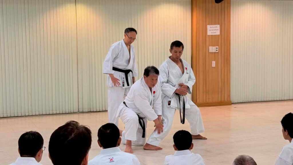 Taniyama Shihan demonstrating a technique with a partner