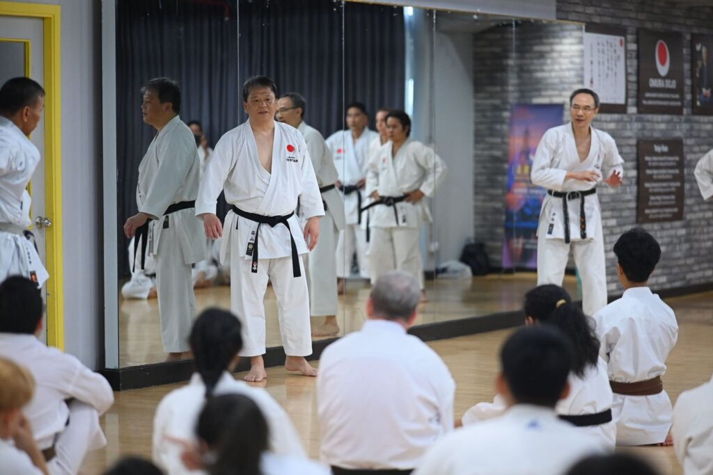 Instructors standing in front of seated participants at the 2025 seminar