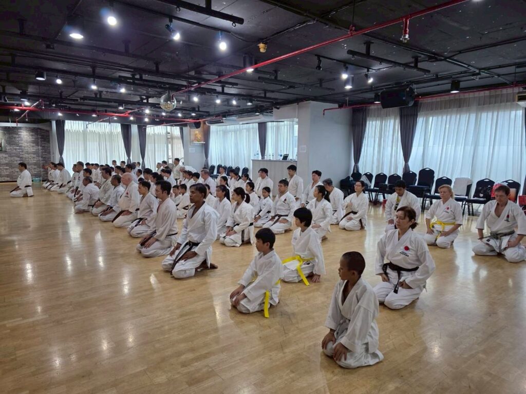 Participants seated in rows in a large studio at the 2025 seminar